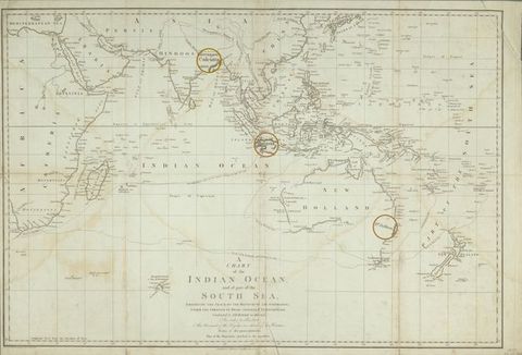 Colour photograph. A coloured map with text in the lower centre front reading, 'A CHART of the INDIAN OCEAN and of part ofthe SOUTH SEA'. Three green rings circle various parts of the map, one encircling Calcutta, another Batavia, and another Port Jackson.